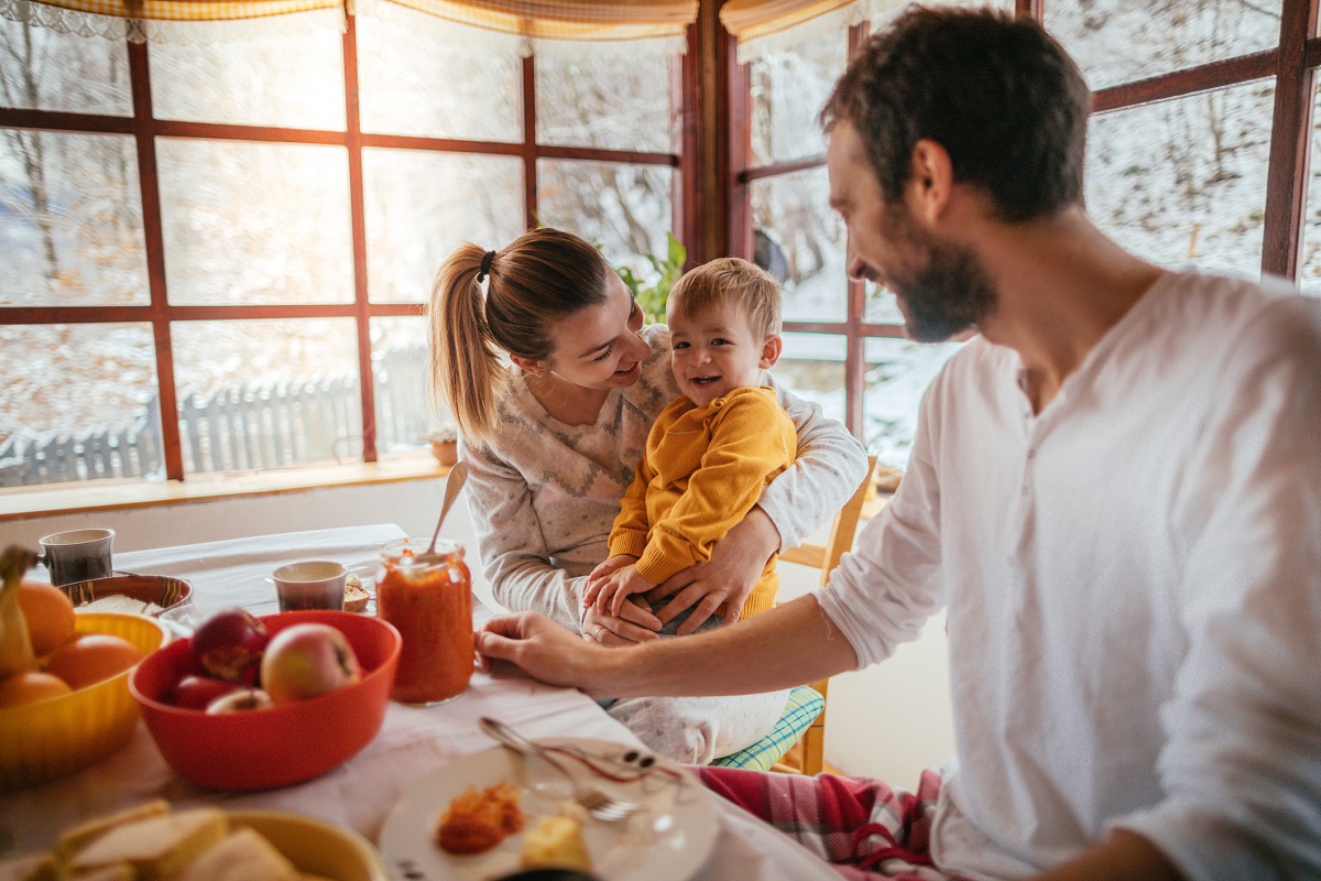 Family enjoying breakfast in winter.