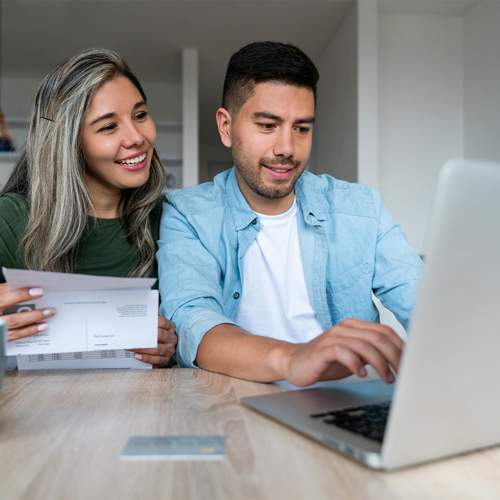 image of couple on laptop