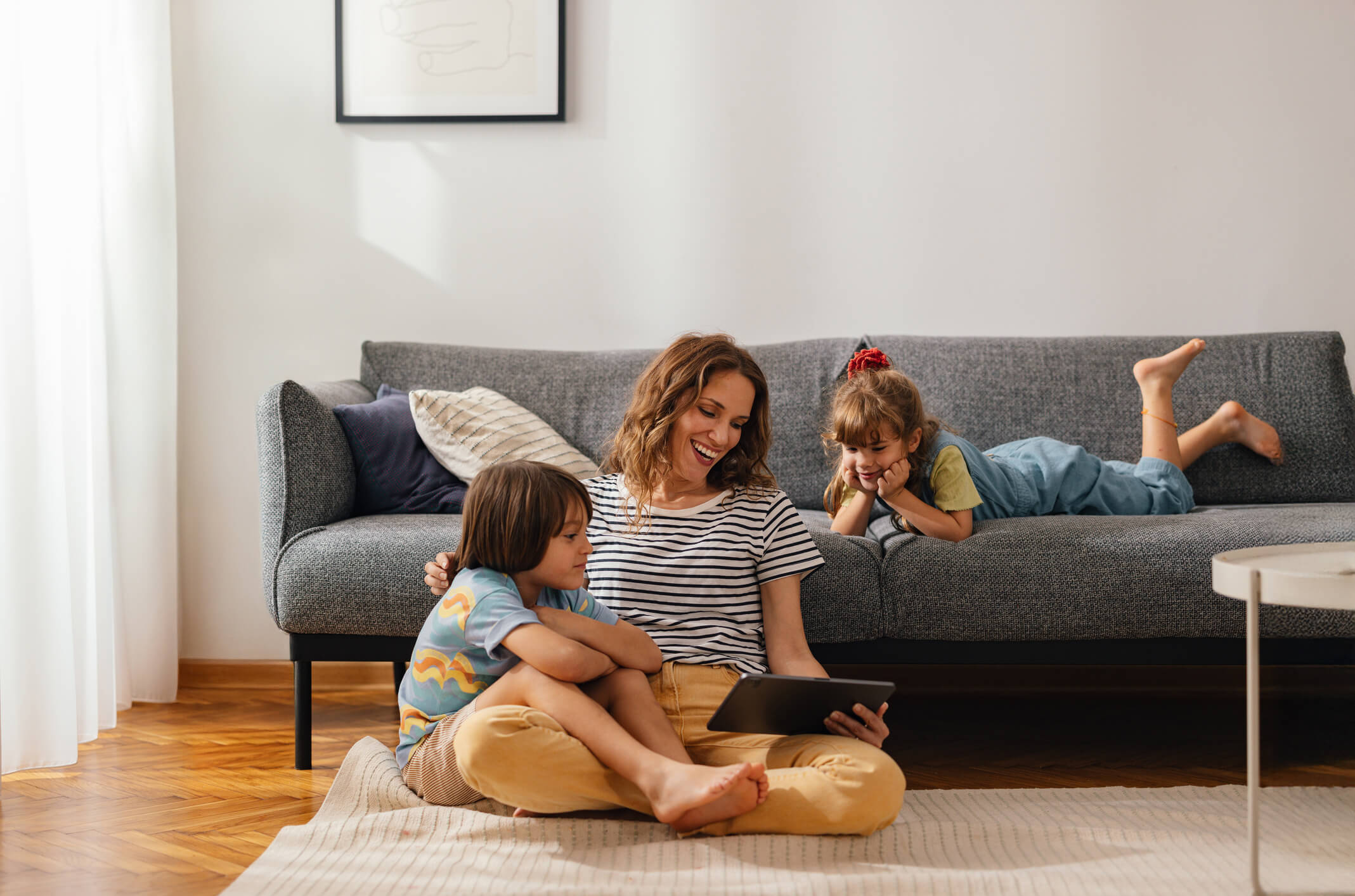 Family hanging out on the livingroom floor