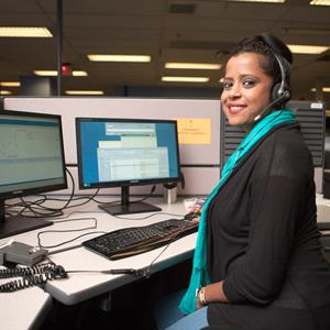 image of a Hydro One call agent sitting near her computer