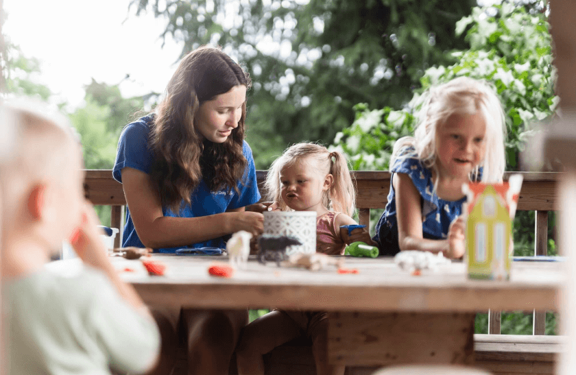 Photo of Della caring for the children