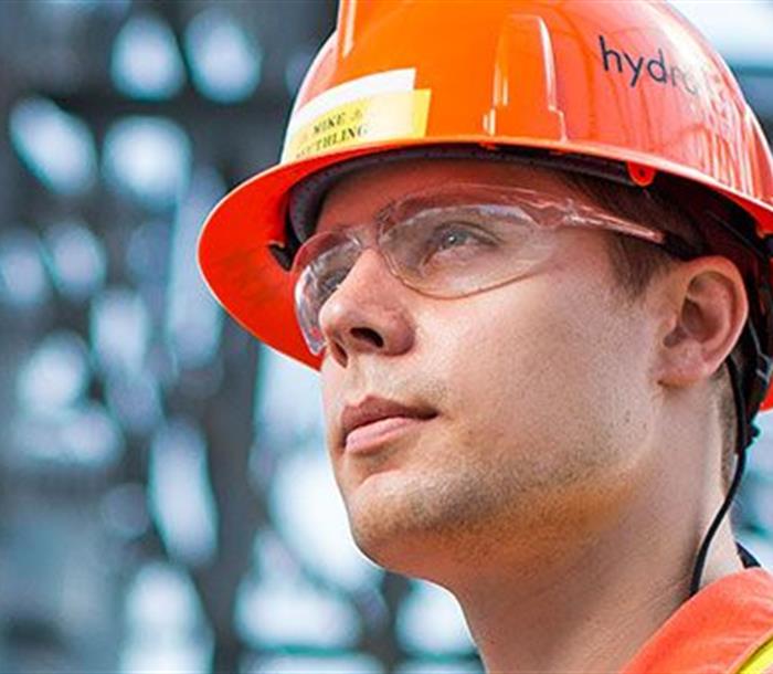 photo of a Hydro One worker wearing a hard hat
